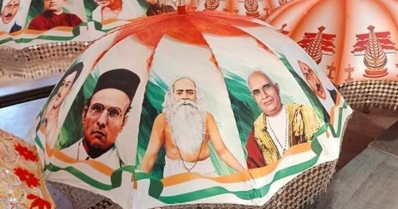 പൂരം കുടയില്‍ സവർക്കറുടെ ചിത്രം; വിവാദമായതോടെ പിന്‍വലിച്ചു