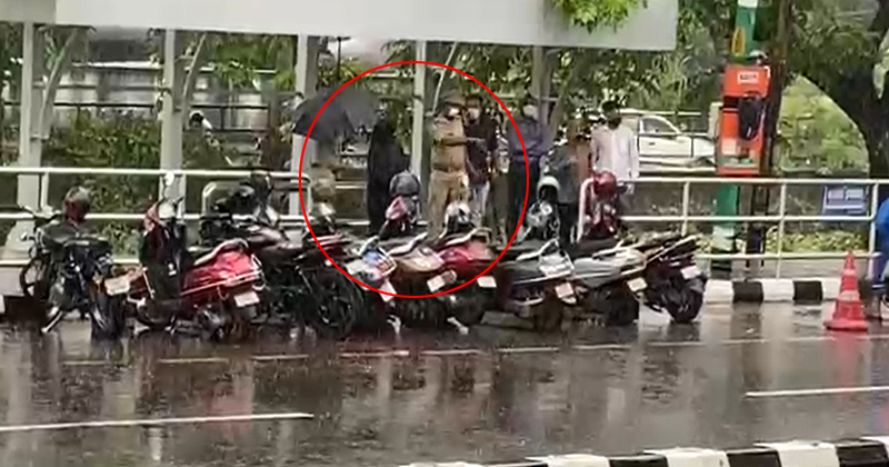 കറുത്ത പർദ്ദ ധരിച്ച് ബസ് കാത്തുനിന്ന സ്ത്രീയെ മഴയത്ത് ഇറക്കിവിട്ട് പോലീസ്; അതിരുവിടുന്ന കറുപ്പ് പേടി