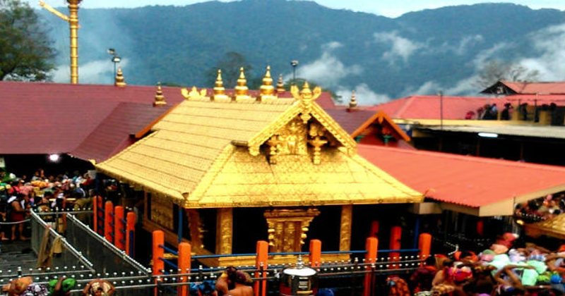 ശബരിമല തീര്‍ത്ഥാടകരുടെ വാഹനങ്ങള്‍ വഴിയില്‍ പിടിച്ചിട്ടു; പോലീസും ദേവസ്വം ബോര്‍ഡ് അംഗവും തമ്മില്‍ വാക്‌പോര്